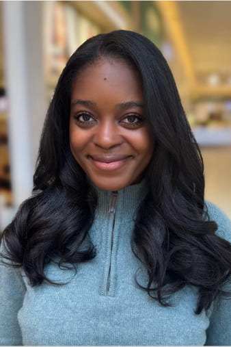 Client with type 4A hair, silk pressed into soft bouncy curls.